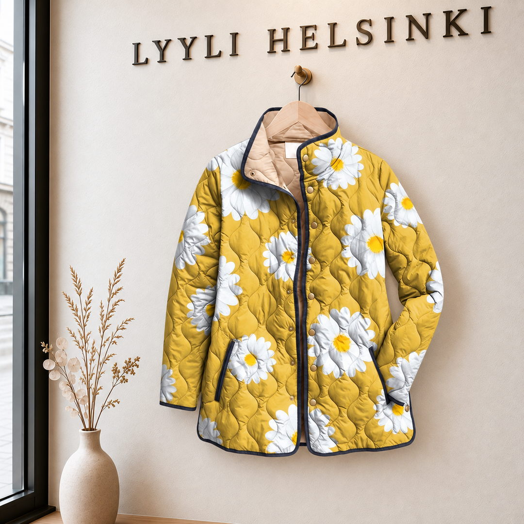 Auli | Keltainen päivänkakkarakuosinen tikkitakki